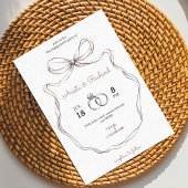 Elegant engagement party invitation with a bow  招待状