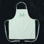 Elegant Monogram Name Green Stripe エプロン<br><div class="desc">Add a touch of elegance to everyday cooking and baking with this feminine personalized apron. Featuring a soft green and white striped background, this stylish apron is beautifully finished with your initial and name in a fancy script font, creating a timeless and sophisticated look. Perfect for home cooks, bakers, entertainers,...</div>