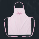 Elegant Monogram Name Pink Stripe エプロン<br><div class="desc">Add a touch of elegance to everyday cooking and baking with this feminine personalized apron. Featuring a soft pink and white striped background, this stylish apron is beautifully finished with your initial and name in a fancy script font, creating a timeless and sophisticated look. Perfect for home cooks, bakers, entertainers,...</div>