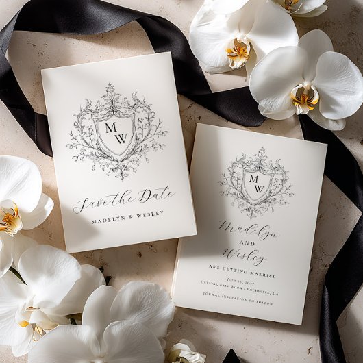 Elegant script monogram crest  セーブザデート