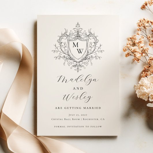 Elegant script monogram crest  セーブザデート