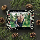 Elegant Winter Watercolor Greenery Botanical Photo シーズンカード<br><div class="desc">This elegant holiday photo card features a single horizontal photo framed by beautiful watercolor eucalyptus, holly, and berries over a chic black background. The editable greeting on the front says "Happiest Holidays". The back of the card is a simple black background to which you can add another photo and/or additional...</div>