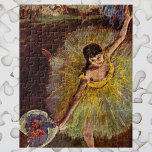 End of an Arabesque by Edgar Degas, Vintage Ballet ジグソーパズル<br><div class="desc">End of an Arabesque (1877) by Edgar Degas is a vintage impressionism fine art portrait painting featuring the prima ballerina, Rosita Mauri, holding a bouquet of flowers at the end of a performance. In ballet an arabesque is a posture in which the body is supported on one leg, with the...</div>