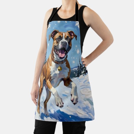 Energetic Boxer Dog Leaping in Winter Snow Fun エプロン (インサイチュ)