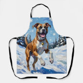 Energetic Boxer Dog Leaping in Winter Snow Fun エプロン (正面)