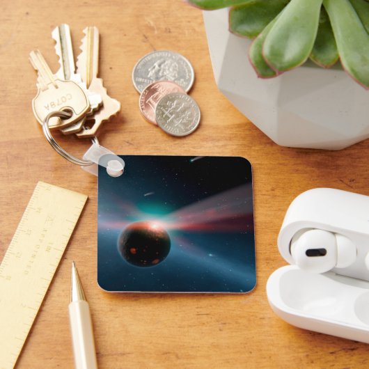 Eta Corviシステムの彗星の嵐。 キーホルダー (デスク)