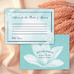 Ethereal Crystal Blue Magnolia結婚の アドバイスカード<br><div class="desc">のアドバイス結婚カードは、抽象芸術フローラの背景に同じ色合いの繊細な水色のマグノリアの花を搭載し、書道の台本には「新郎新婦のためのアドバイス」と題され、2つの薄いエレガントに囲まれて縁ど。背面には、グリッターの背景と水晶の青いマグノリアの上にあなたの名前、日付、都市と州があるフェイク（あなたが望むように取り外し可能）更なるカスタマイズのためにクリックは、"パーソナライズ"リンクを使用して、このテンプレートを変更するために当社のデザインツールを使用する。</div>