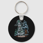 Fの木の後ろのUFOのエイリアンから隠れている大足 キーホルダー (裏面)