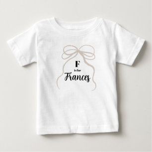 FはFrancesの名前を明かす服 赤ちゃん ガールズボウ ベビーTシャツ