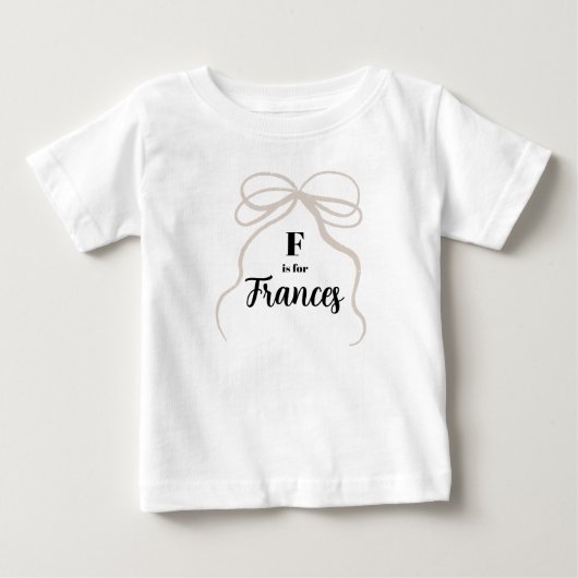 FはFrancesの名前を明かす服 赤ちゃん ガールズボウ ベビーTシャツ (正面)