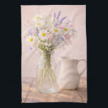 Farmhouse Wildflower Jar and Ceramic Pitcher キッチンタオル<br><div class="desc">This farmhouse wildflower kitchen towel features a soft bouquet of daisies, lavender, and delicate pink flowers arranged in a clear glass jar beside a classic white ceramic pitcher. The warm rustic wooden table and gentle natural lighting create a peaceful cottage inspired scene. Perfect for farmhouse kitchens, dining rooms, bedrooms, or...</div>