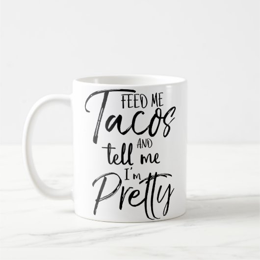 Feed Me Tacos And Tell Me I'M Pretty Funny コーヒーマグカップ (左)