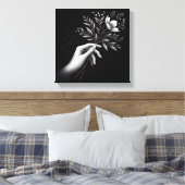 Feminine Hand with Elegant Floral Stem キャンバスプリント (インサイチュ (寝室))