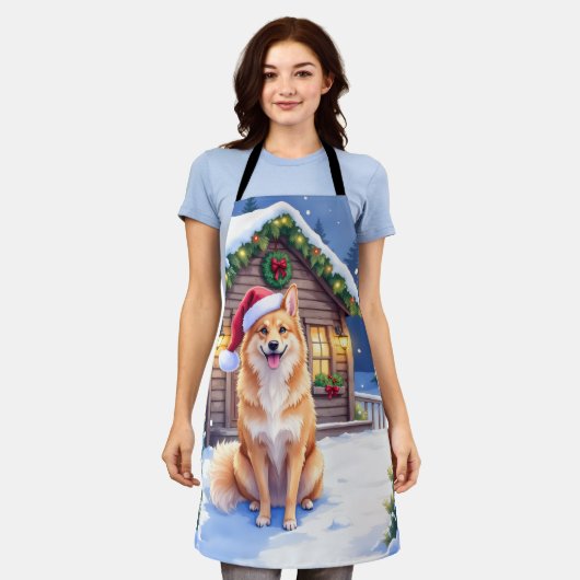 Finnish Spitz Snowy Cabin Santa Hat Christmas Art エプロン (着用した状態)