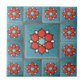 Fireyのオレンジおよびティール（緑がかった色）のヴィンテージの花模様 タイル (正面)