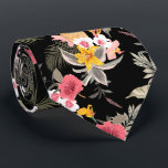 Floral Hibiscus Pineapple Hawaiian Print on Black ネクタイ<br><div class="desc">Exotic pink and white hibiscus flowers, yellow lilies, pineapples, palm fronds and tropical foliage on a black background, this men's neck tie is cool for the office, a night on the town, a wedding, for the groom or groomsmen or give as a gift to your husband, dad, brother or best...</div>