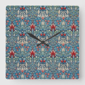 Floral pattern on green leaves blue background スクエア壁時計 (正面)