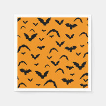 Flying bats on orange
