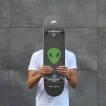 Flying Saucer & Green Alien Skateboard スケートボード<br><div class="desc">A Skateboard for those who believe or science fiction fan. It is decorated with a green alien,  a flying saucer and a customizable message "Believe"! Perfect gift to a geek!</div>