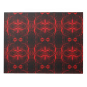 Formas em vermelho 'flutuando'sobre fundo preto. ノートパッド (正面)