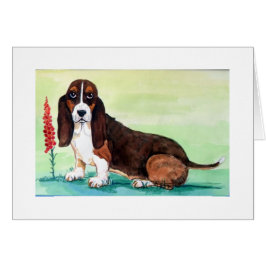 Foxgloveの花を持つBasset犬