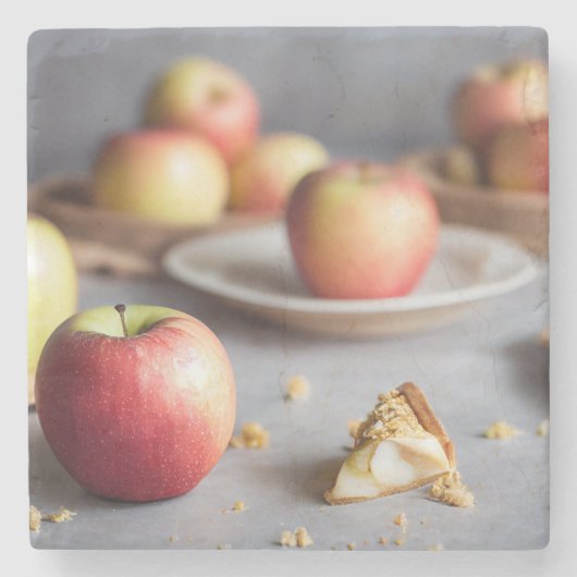 Fresh red apples on the table, apple pie crumbs ストーンコースター (正面)