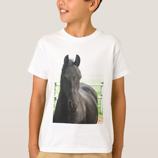 Friesianの馬の子供のTシャツ Tシャツ (正面)
