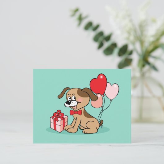 Fröhlicher Welpe mit einem Geschenk ポストカード (スタンド正面)