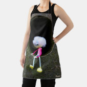 Fubby poppetje dat in een muur zit. エプロン (インサイチュ)