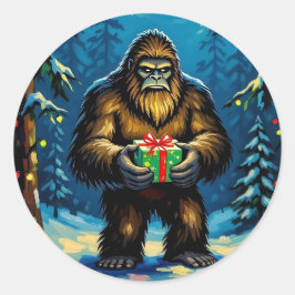 Funny Bigfoot holding a Christmas Gift ラウンドシール