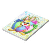 Funny Bunny biting an Easter Egg ノートパッド (回転)