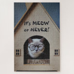 Funny Cat Wearing Glasses It's Meow or Never Quote ジグソーパズル<br><div class="desc">Design features image of a serious cat wearing black glasses while looking outside from house. Text reads "It's MEOW or Never!" Text template may be easily customized.</div>
