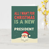 Funny Christmas Card All I Want Is A New President カード (黄色い花)