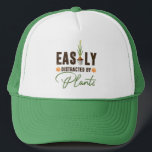 Funny easily distracted by plants bulb pot  キャップ<br><div class="desc">Easily distracted by plants, in a slightly messy distressed font like it had been playing in the dirt all day. A cute bulb in a pot is sprouting some plant magic and two orange flowers add to the design. A great gift for a gardener, plant lover, succulent enthusiast. This hat...</div>
