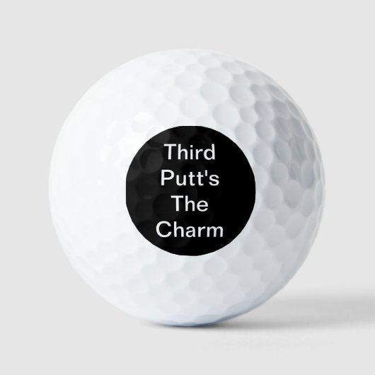 Funny Golf Gift Joke Third Putt's The Charm Black ゴルフボール (正面)