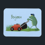 Funny green frog mowing lawn cartoon マグネット<br><div class="desc">A funny green frog mowing the lawn in silly cartoon style.</div>