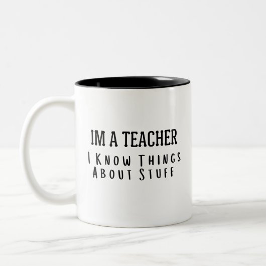 Funny Im A Teacher, I Know Things About Stuff  ツートーンマグカップ (左)
