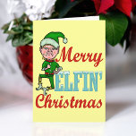 Funny Merry Elfin Christmas シーズンカード<br><div class="desc">Merry Elfin' Christmas. This funny, tough Santa's elf would like you to have a merry Xmas. Actually, he's insisting on it. The design shows an angry holiday elf next to the words "Merry Elfin' Christmas." A humorous design for anyone who thinks "bah humbug" during the holidays. Personalize the inside of...</div>