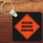 Funny orange wood work ahead caution road sign  キーホルダー (正面)