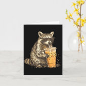 Funny raccoon drinking iced coffee animal meme men カード (黄色い花)