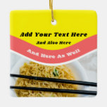 Funny Ramen Noodles Packet Custom Message セラミックオーナメント<br><div class="desc">Add your own funny saying or personalized message to create your own ramen themed Christmas tree ornament. This ornament is designed to look like a packet of ramen noodles with bright red and yellow graphics above a photo of ramen noodles in a bowl. Makes the perfect Christmas gift for someone...</div>