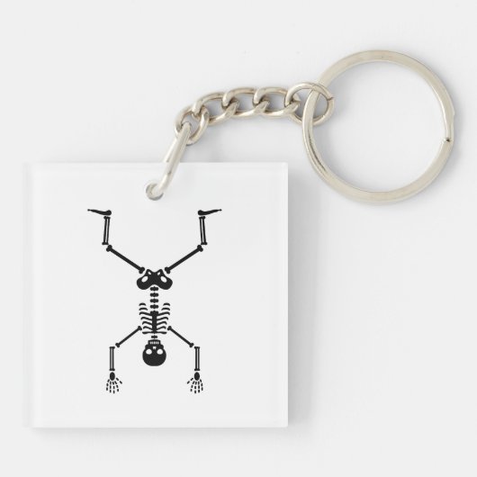 Funny skull doing handstand キーホルダー (裏面)