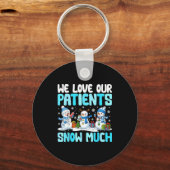 Funny Snowman Nurse We Love Our Patients Snow Much キーホルダー (正面)