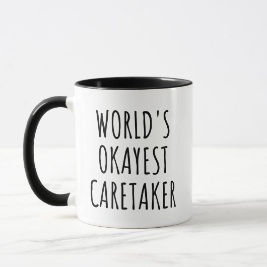 Funny World's Okayest Caretaker  マグカップ (左)