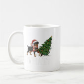 Funny Xmas Rottweiler Pushing Christmas Tree Over コーヒーマグカップ (左)