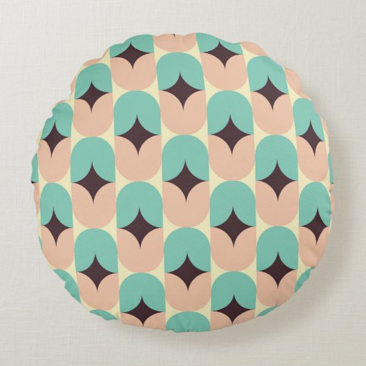Geometric pattern of teal, beige, and black shapes ラウンドクッション (正面)