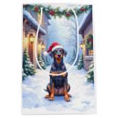 German Pinscher Snowy Courtyard Santa Hat ミディアムペーパーバッグ (正面)
