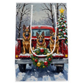 German Shepherd Christmas Red Truck Holiday ミディアムペーパーバッグ (裏面)