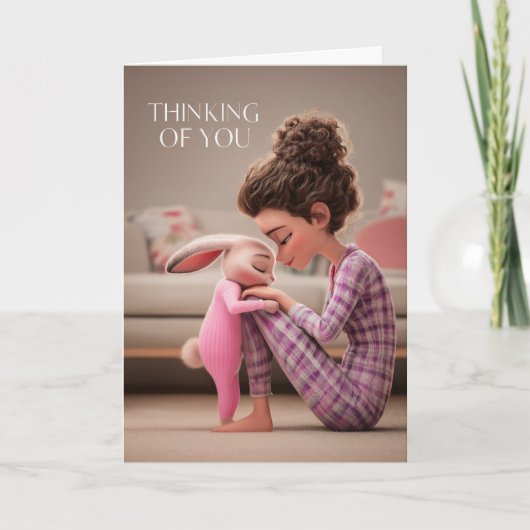 Girl Sitting with Bunny in Pajamas Thinking of You カード (正面)