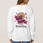 Give To Gain Tシャツ 国際女性デー 2026 (裏面)